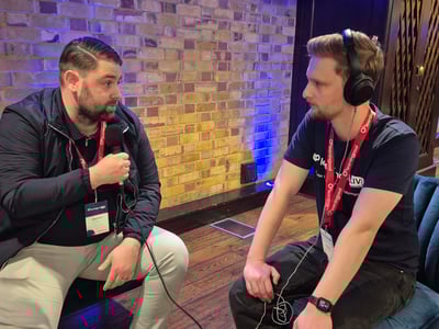 Luke Smith interviewing attendees at Learning Pool Live 2025