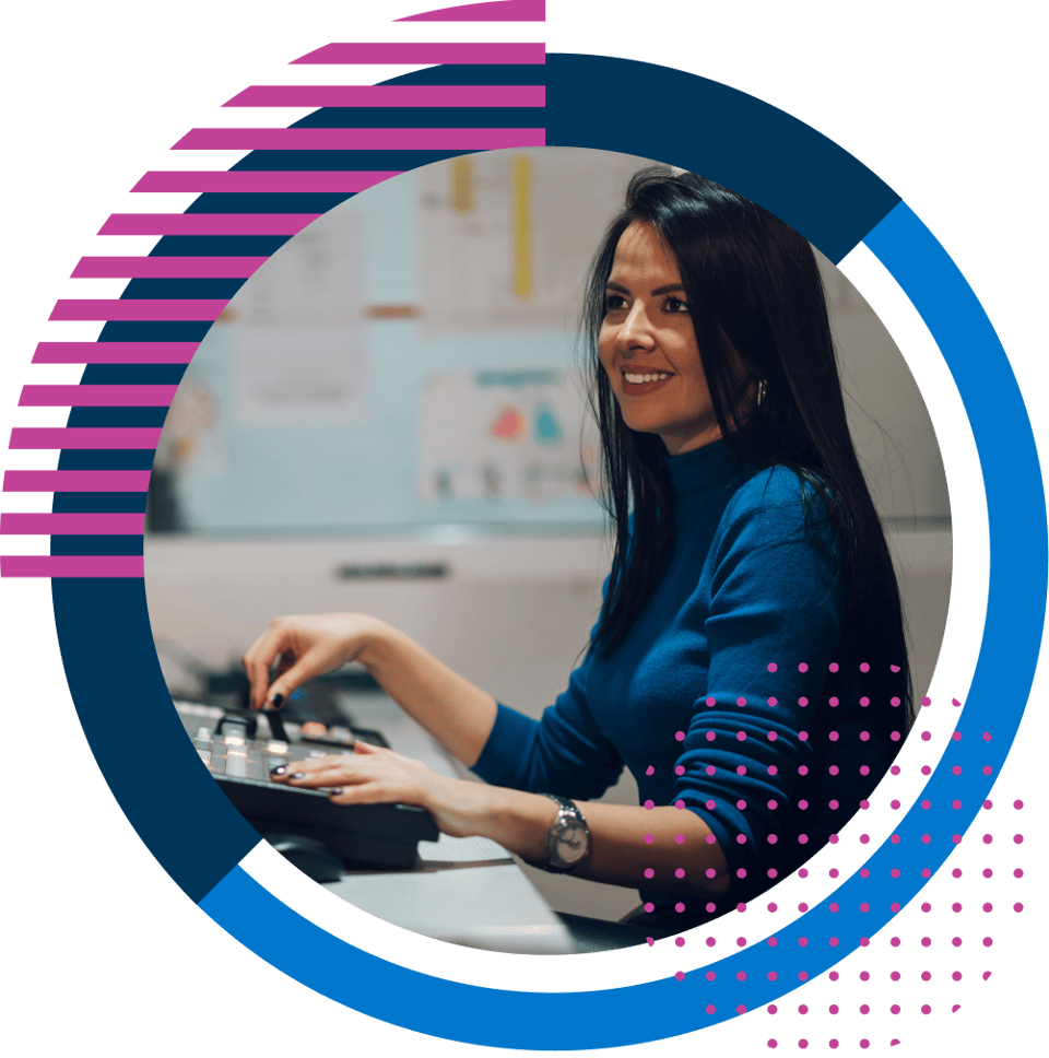 Woman smiling and working at desk