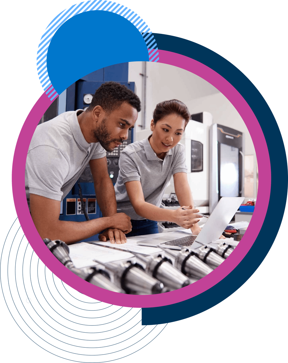 Colleagues in a kitchen environment with laptop