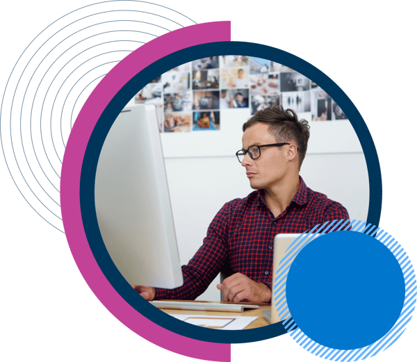 Man at desk using computer